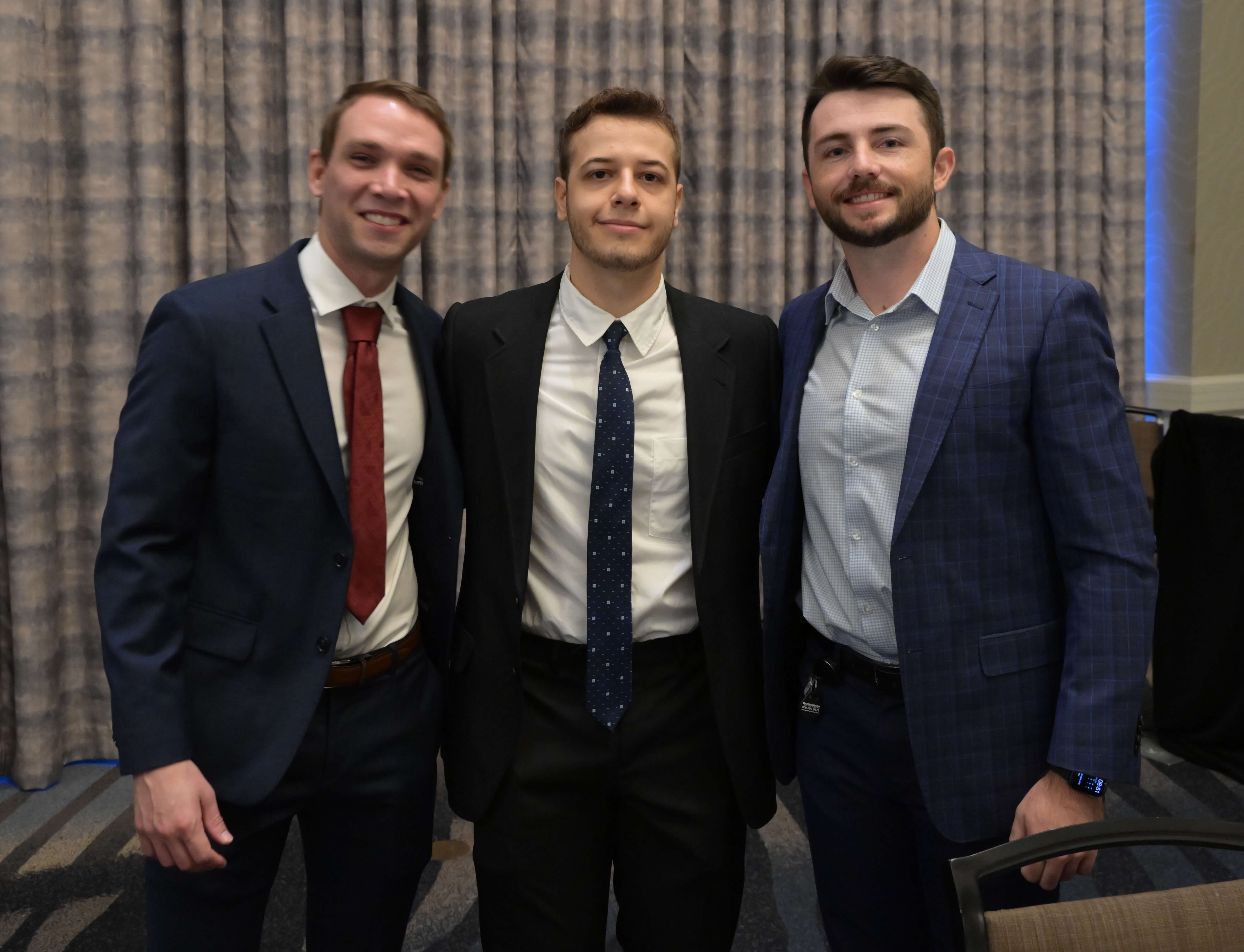 Members of our Business Development IT Team pose at a Town Hall event.